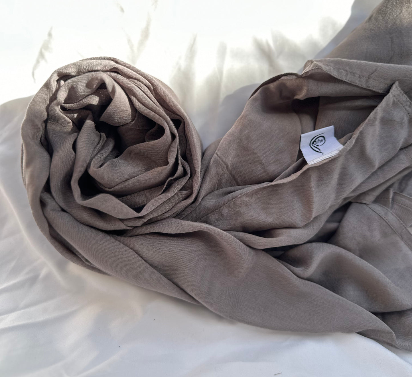 Gray modal hijab crafted from soft, breathable fabric by Zoya Z, designed for secure non-slip comfort and modest everyday styling.