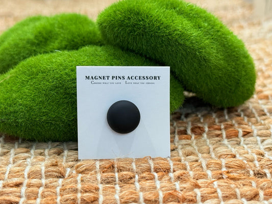 Black hijab magnet with strong hold and sleek finish, designed for secure, snag-free styling in a versatile, timeless black tone.
