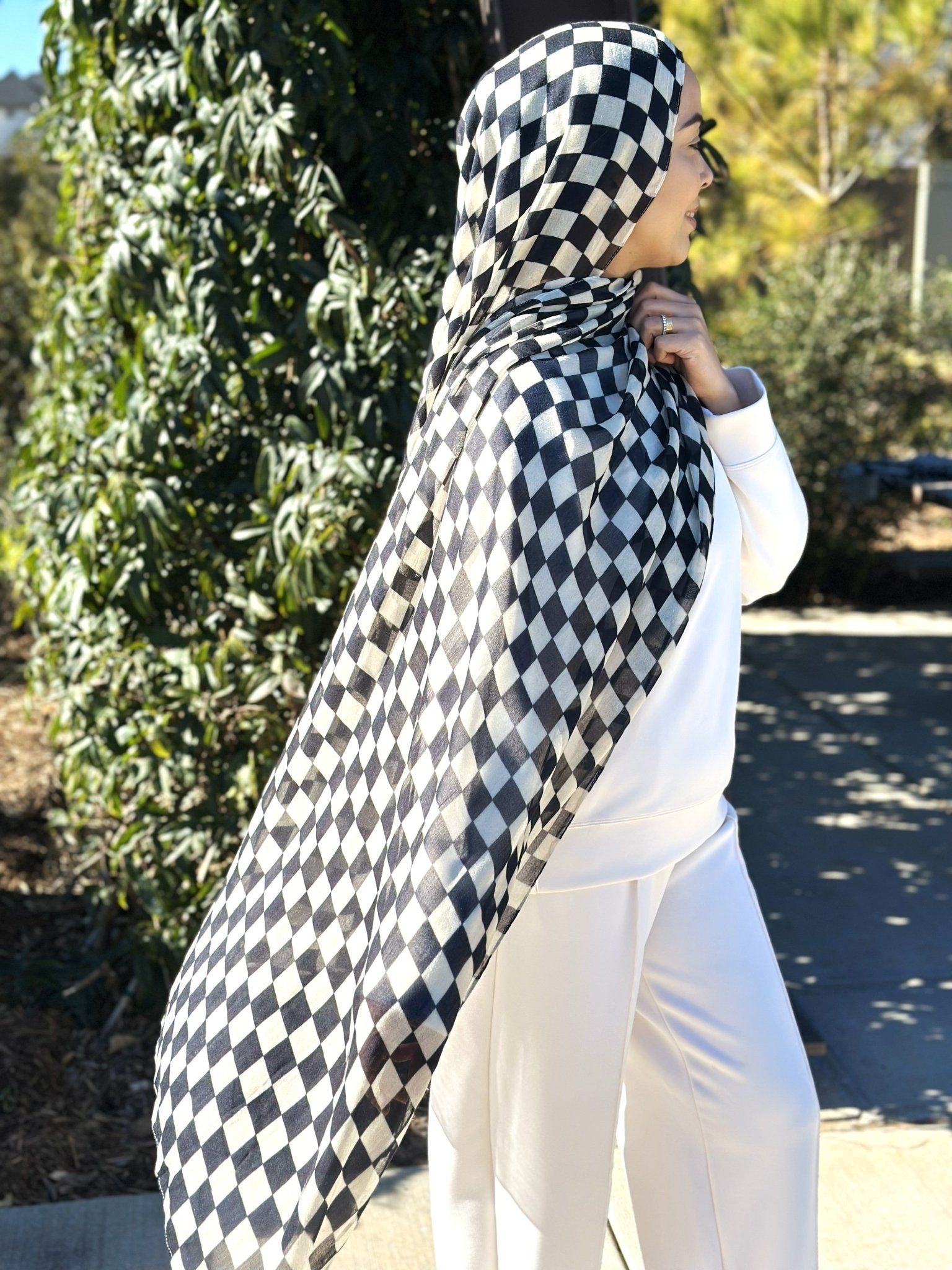 Model wearing Checkered Modal Hijab with lightweight drape and elegant checkered design