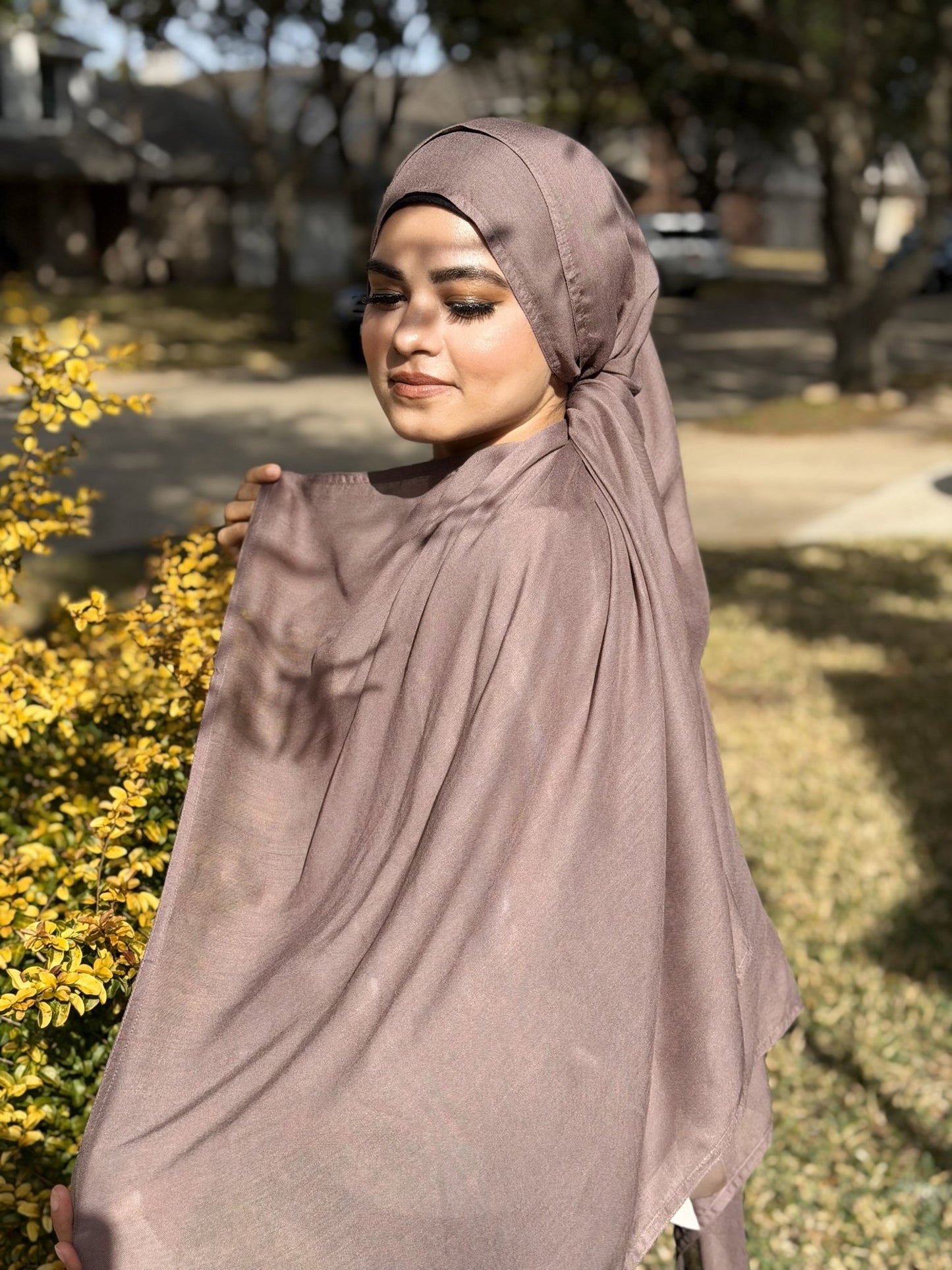 Lightweight mushroom modal hijab with elegant flow and breathable texture, styled casually outdoors for daily wear