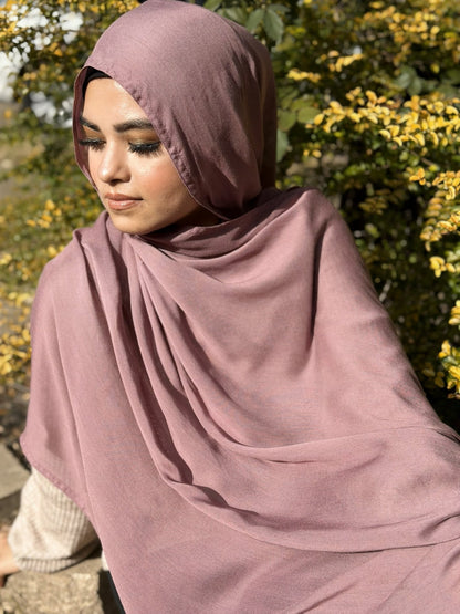 Lightweight lilac modal hijab with elegant drape and breathable texture, styled simply for everyday use