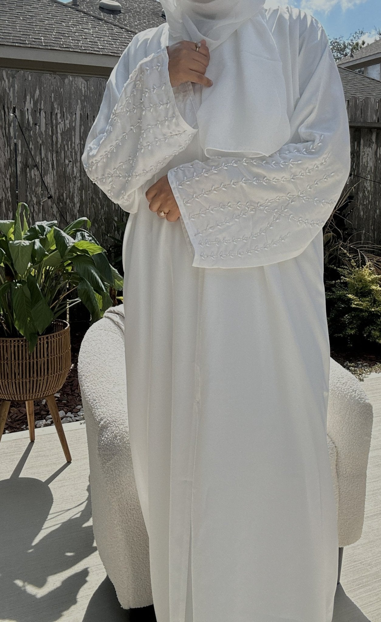 White nida abaya featuring pearl-embellished sleeves with matching belt and chiffon hijab | Zoya Z