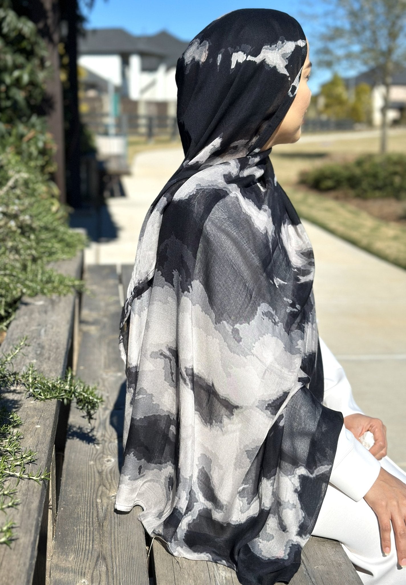 Model wearing Black Ash Watercolor Modal Hijab with soft flowing drape and artistic design