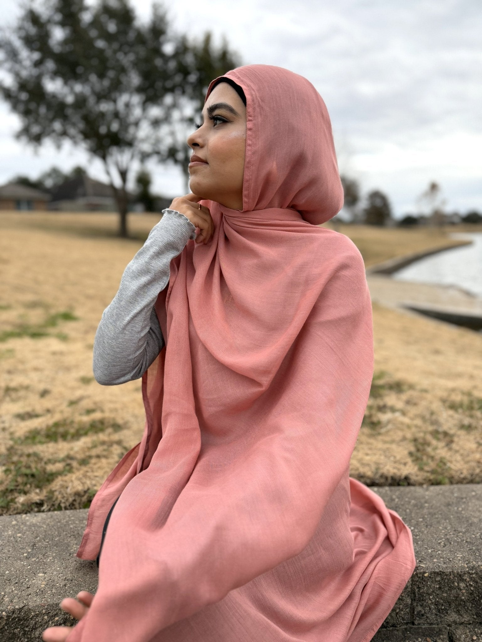 Lightweight pink modal hijab with elegant drape and breathable texture, styled simply for everyday use
