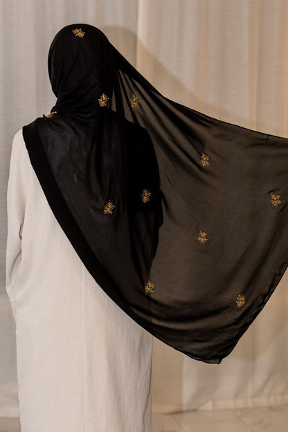 Luxury black chiffon hijab with gold bead embroidery, designed by Zoya Z for elegant modest fashion styling.
