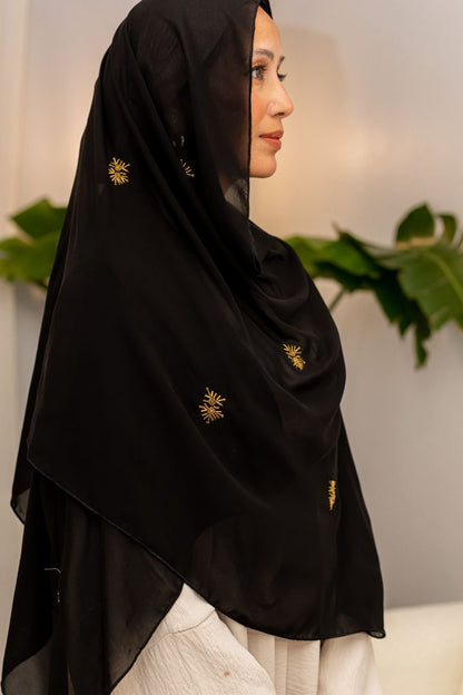 Luxury black chiffon hijab with gold bead embroidery, designed by Zoya Z for elegant modest fashion styling.