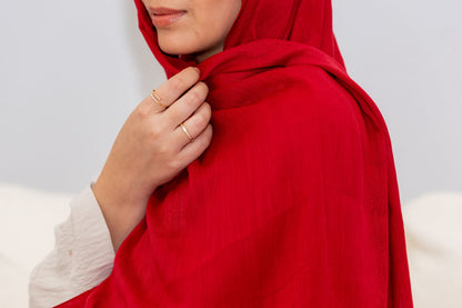 Luxury red rayon hijab with soft drape and breathable texture, designed by Zoya Z for elegant modest fashion styling.