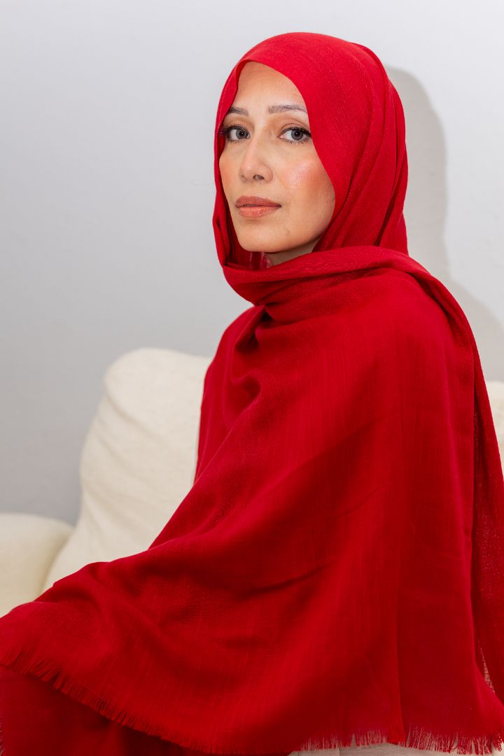 Luxury red rayon hijab with soft drape and breathable texture, designed by Zoya Z for elegant modest fashion styling.