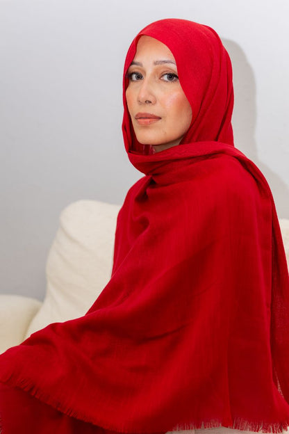 Luxury red rayon hijab with soft drape and breathable texture, designed by Zoya Z for elegant modest fashion styling.